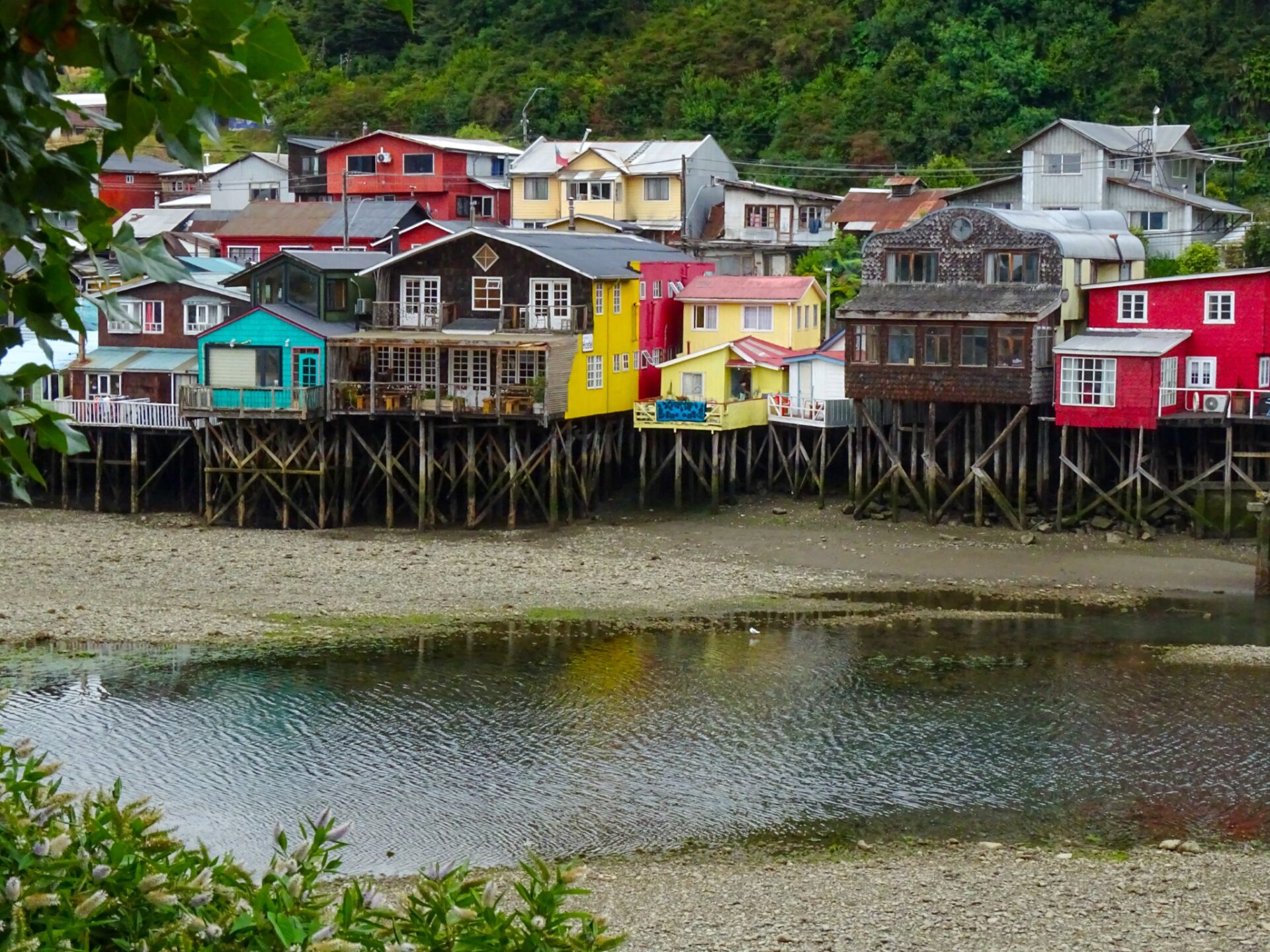Colorful palafitos lining the waterfront in Castro, Chiloé, Chile